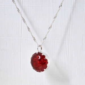 Sunbeam red glass drop pendant with ashes