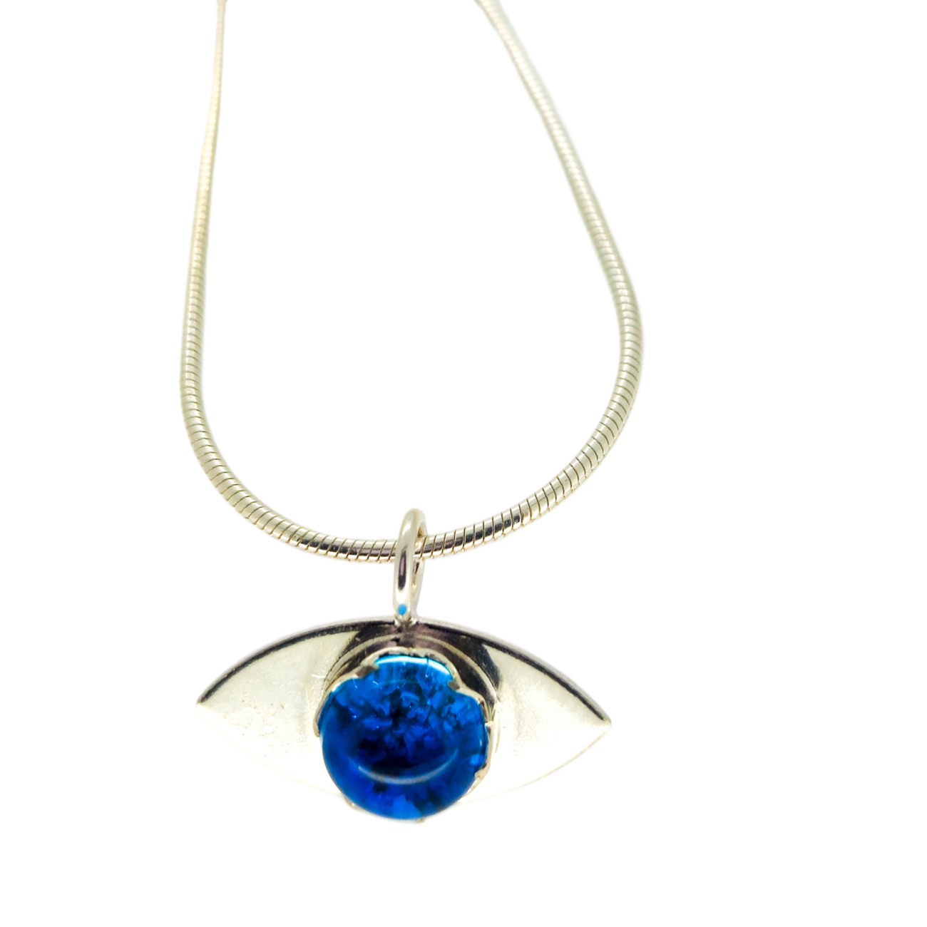 Close up detail of handcrafted ashes in glass necklace made in the Uk