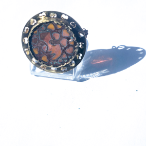 brass shirley brooch amber and copper glass