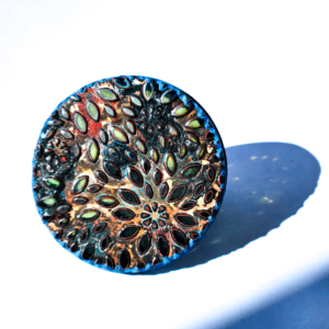 The indigo tearjerker ring, glass jewel with brass