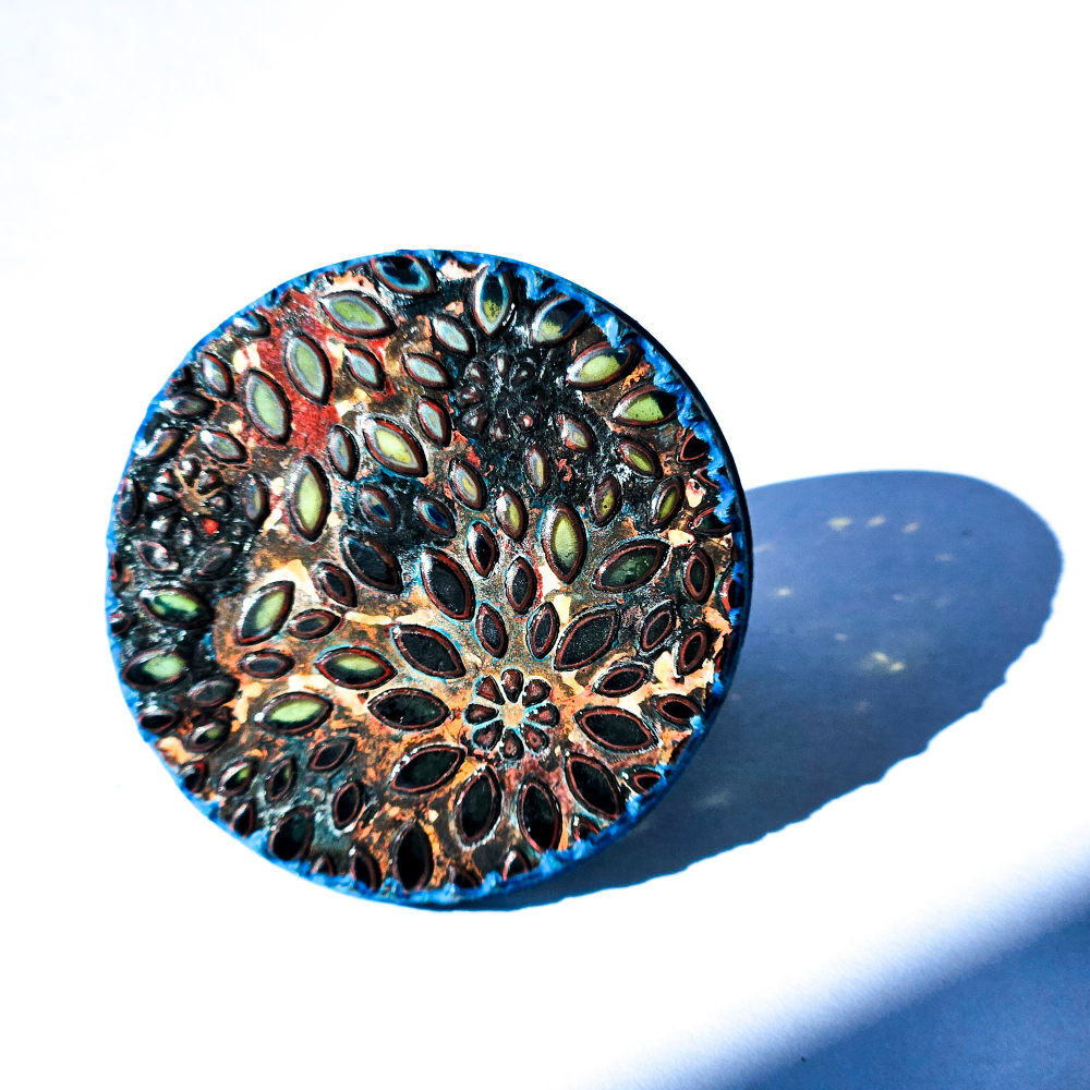 The indigo tearjerker ring, glass jewel with brass
